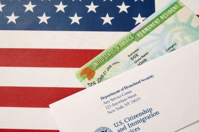 USCIS form with green card